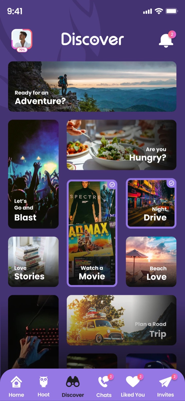 The Discover screen with interests like adventure, food, movies and road trips